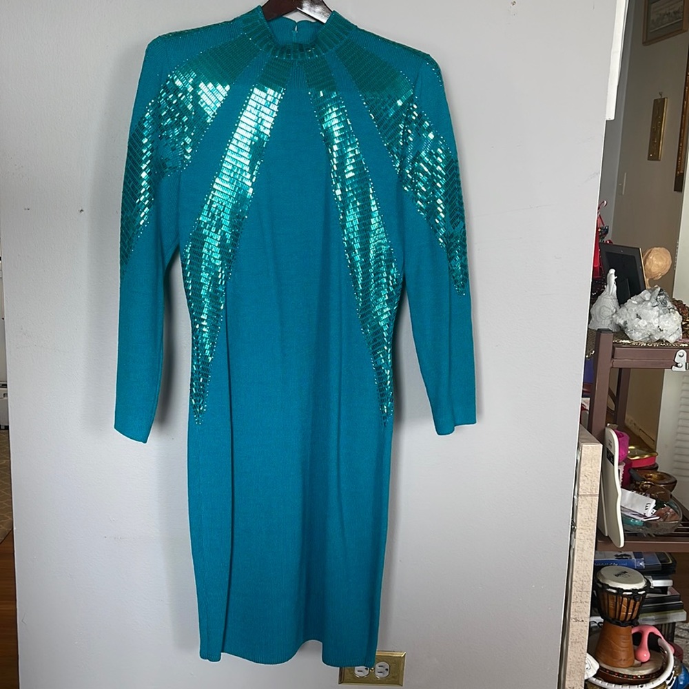 Saint John a beautiful a sparkly dress .